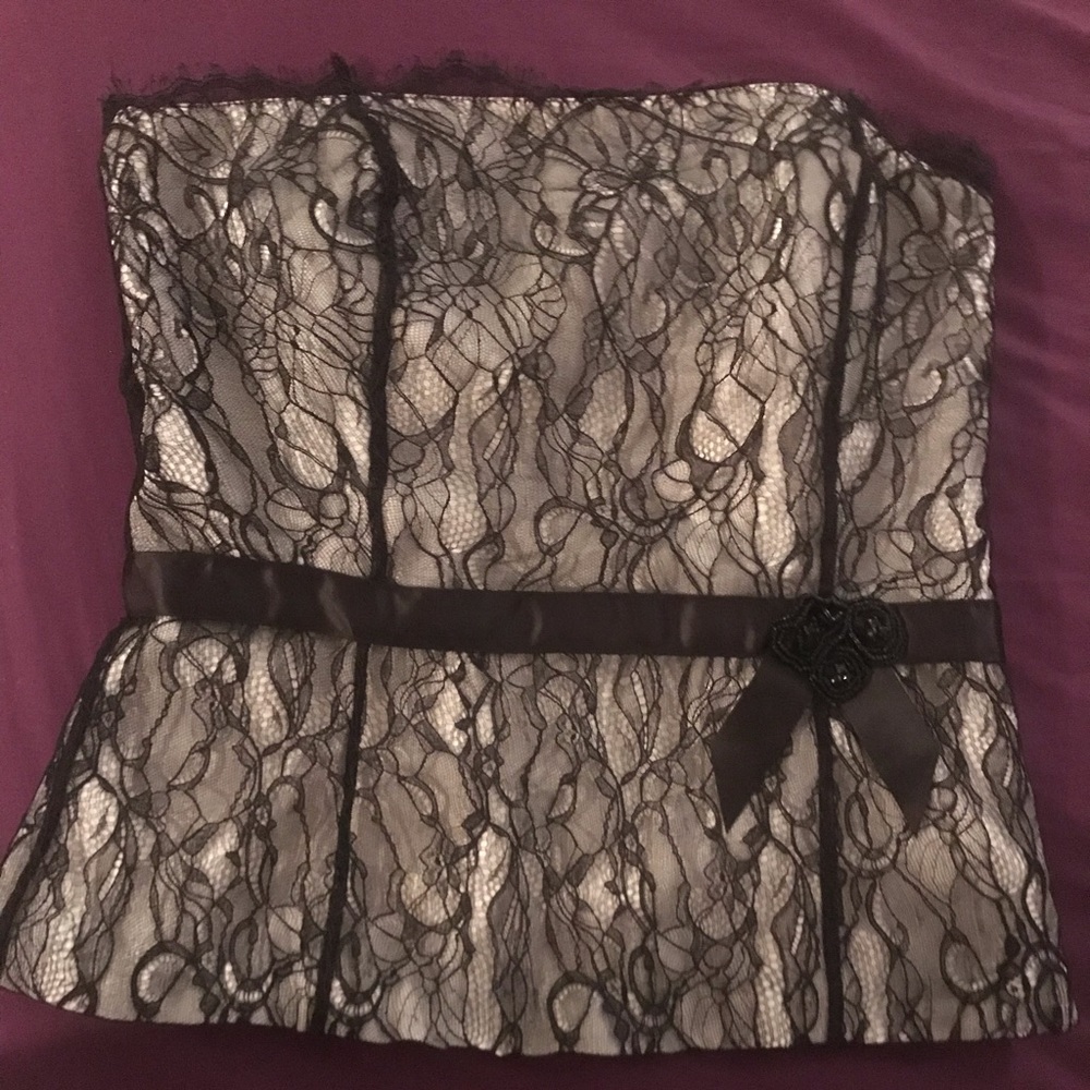 Ann Taylor black lace bustier style top over cream satin.